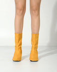 "Good energy only" ankle boot swaps