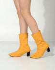 "Good energy only" ankle boot swaps