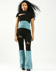 Stretch black and denim pants with cut outs