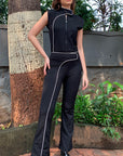 Black pants with a white piping detailing