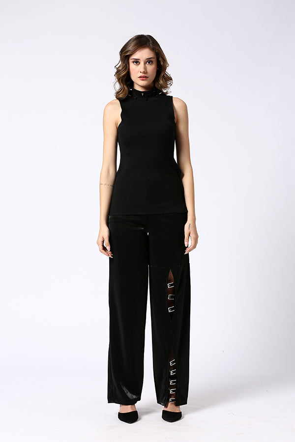 Black stretch pants with multiple buckle detailing