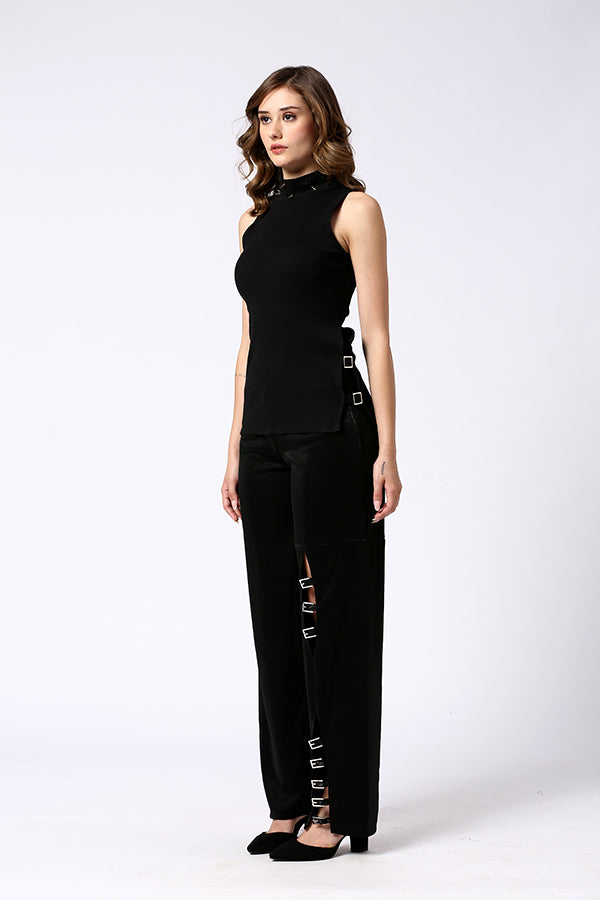 Black stretch pants with multiple buckle detailing